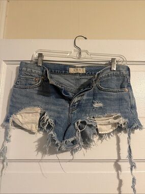 We The Free light blue distressed denim shorts